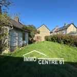 Maison de village à Joué du Bois avec jardin, garage et travaux à prévoir