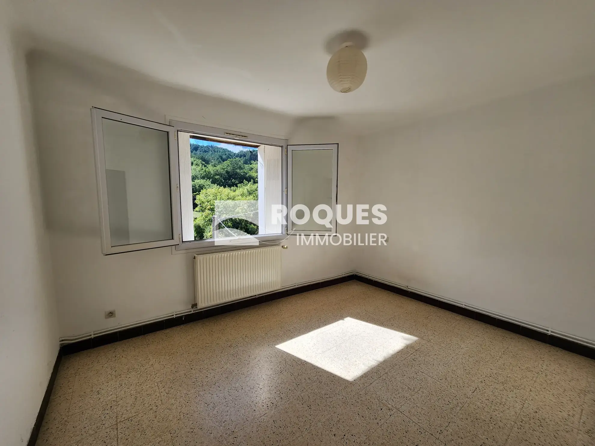 Appartement 3 pièces de 59,71 m² avec garage et balcon près de Lodève 