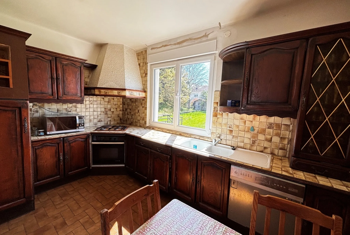 Maison à Exincourt de 112m² avec jardin et sous-sol à rénover 