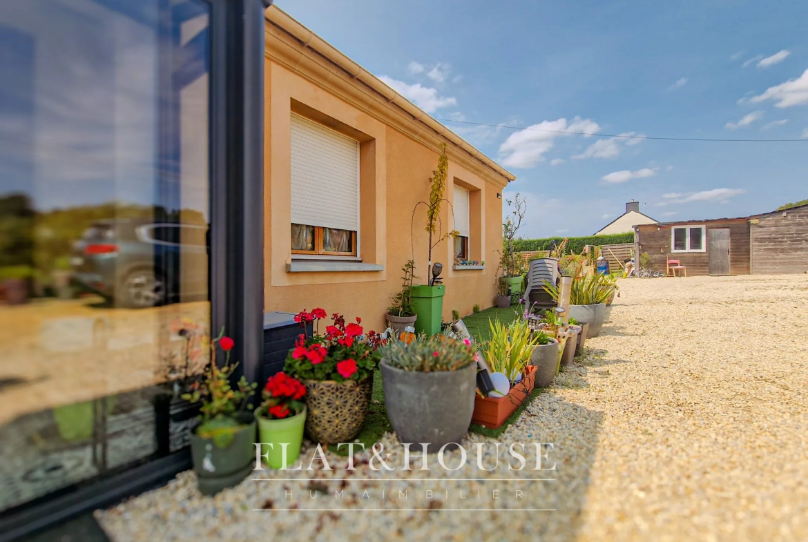 Maison de plain-pied de 100 m² avec grand jardin à Saint Aubin des Chateaux 