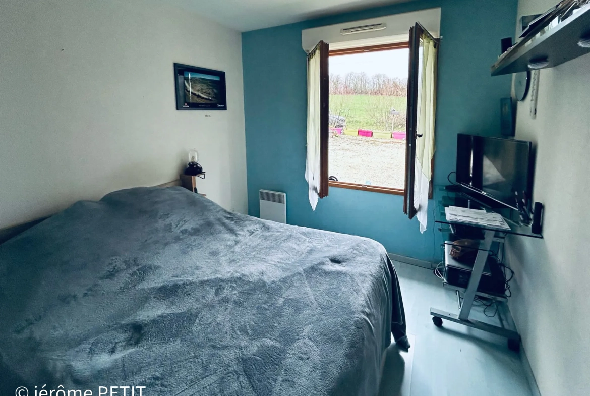Maison de plain-pied de 100 m² avec grand jardin à Saint Aubin des Chateaux 