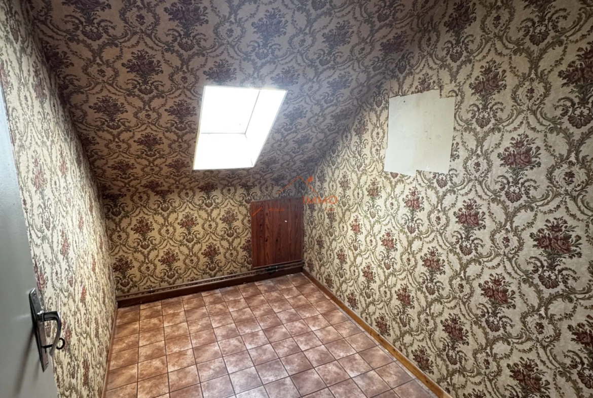 À vendre maison semi plain-pied à Wallers, 3 chambres, jardin, garage, économie d'énergie 