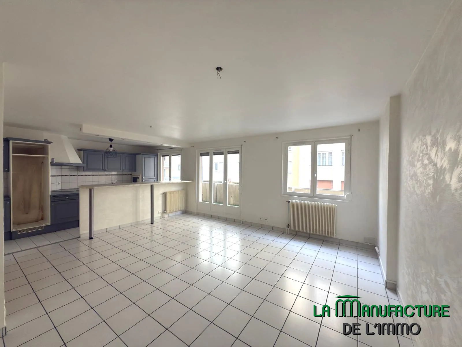 Appartement F2 bis avec balcon, cave et garage à Saint-Étienne 