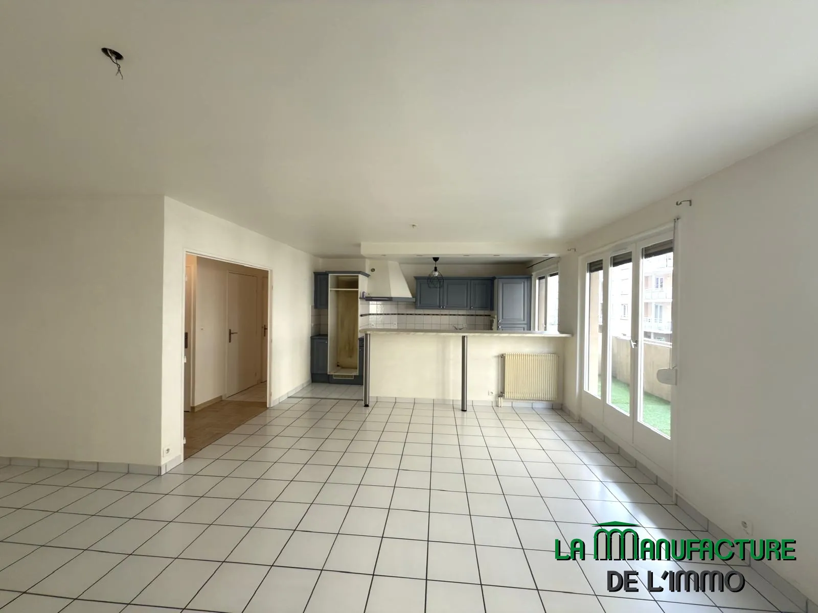 Appartement F2 bis avec balcon, cave et garage à Saint-Étienne 