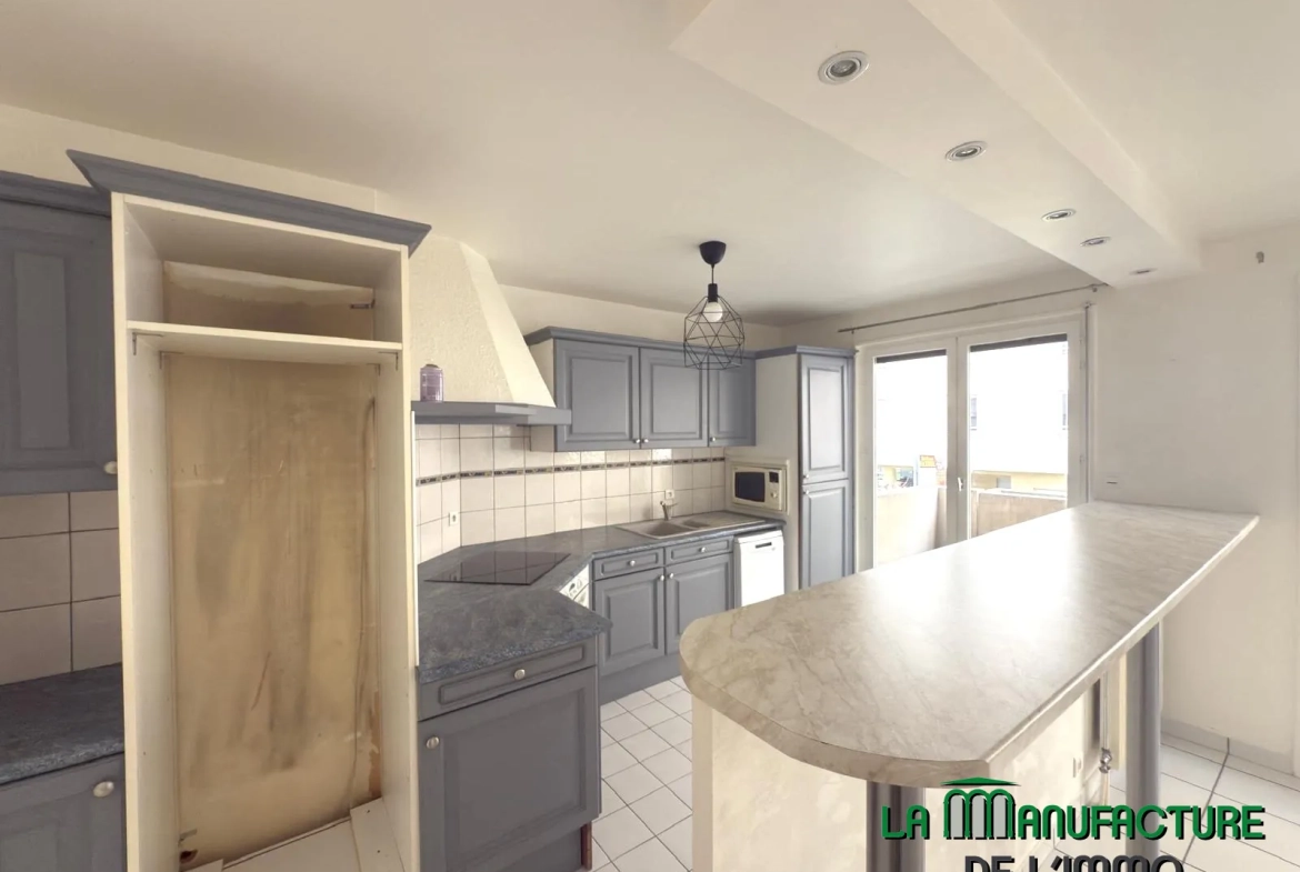 Appartement F2 bis avec balcon, cave et garage à Saint-Étienne 