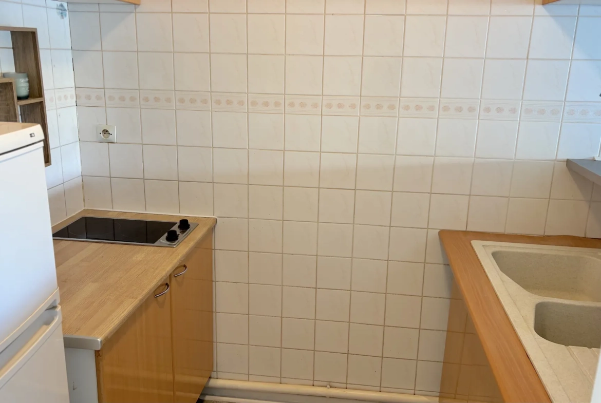 Vente d'un appartement F2 à Carnon-Plage avec loggia et vue port 