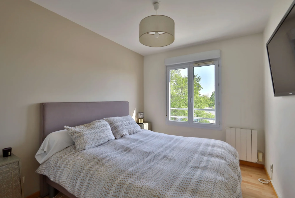 Appartement T4 de 79,92 m² avec balcon et garage à Corbas 