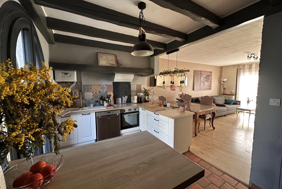 Maison T4 rénovée à Carcassonne avec jardin et garage près du centre-ville 