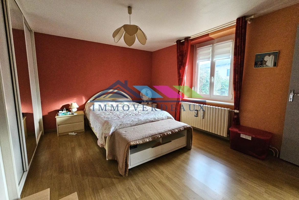 Maison de 140m² à proximité de Nancy avec 4 chambres et garage 