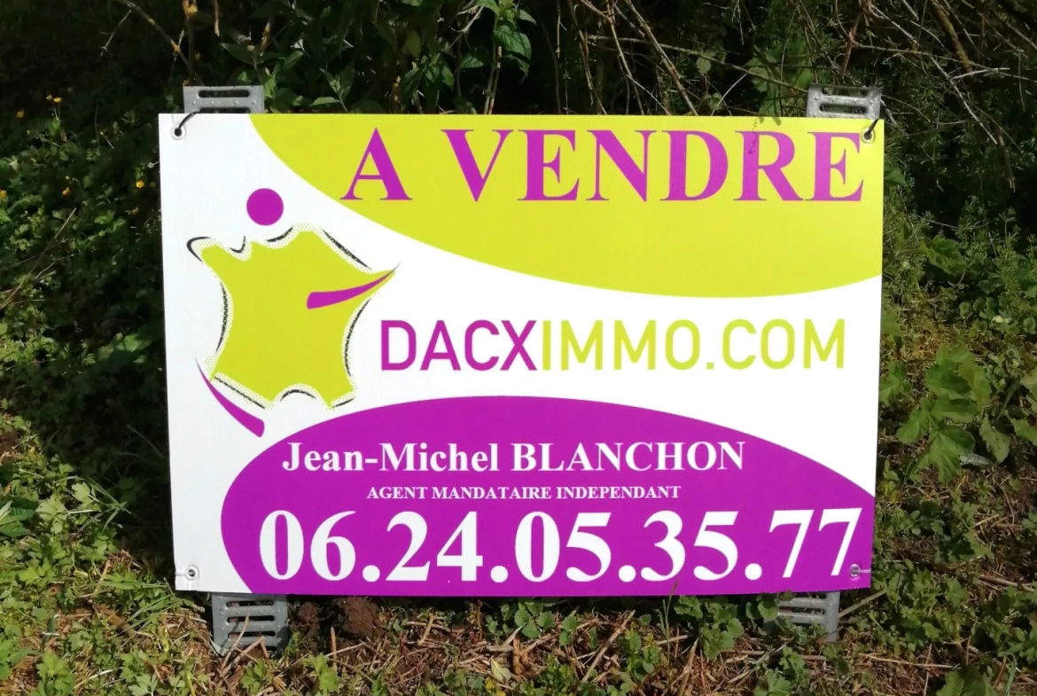 Terrain constructible ensoleillé à Baume-les-Dames de 1855 m² 