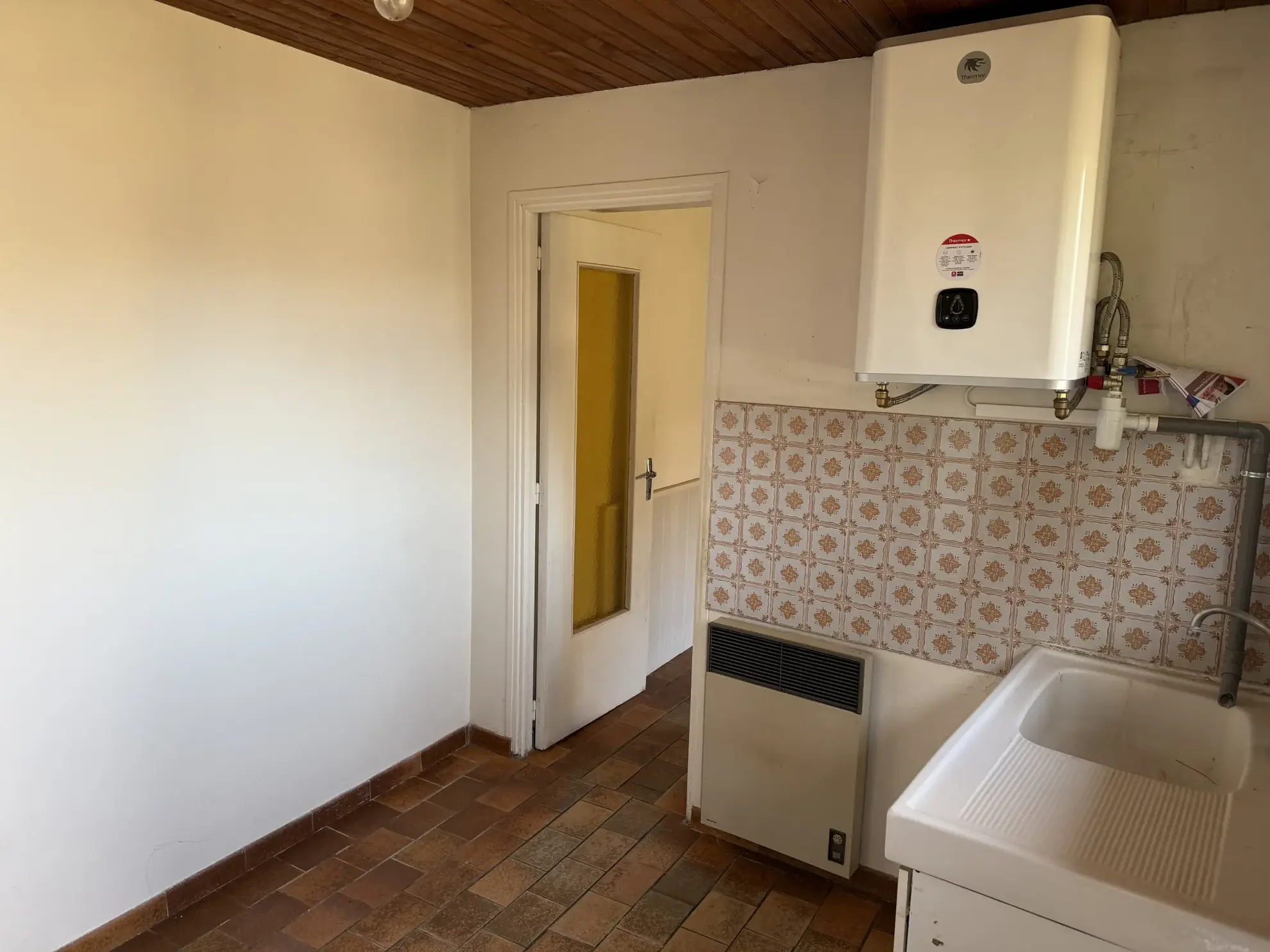 Maison à vendre à Alençon de 24,45 m² avec garage et grand terrain 