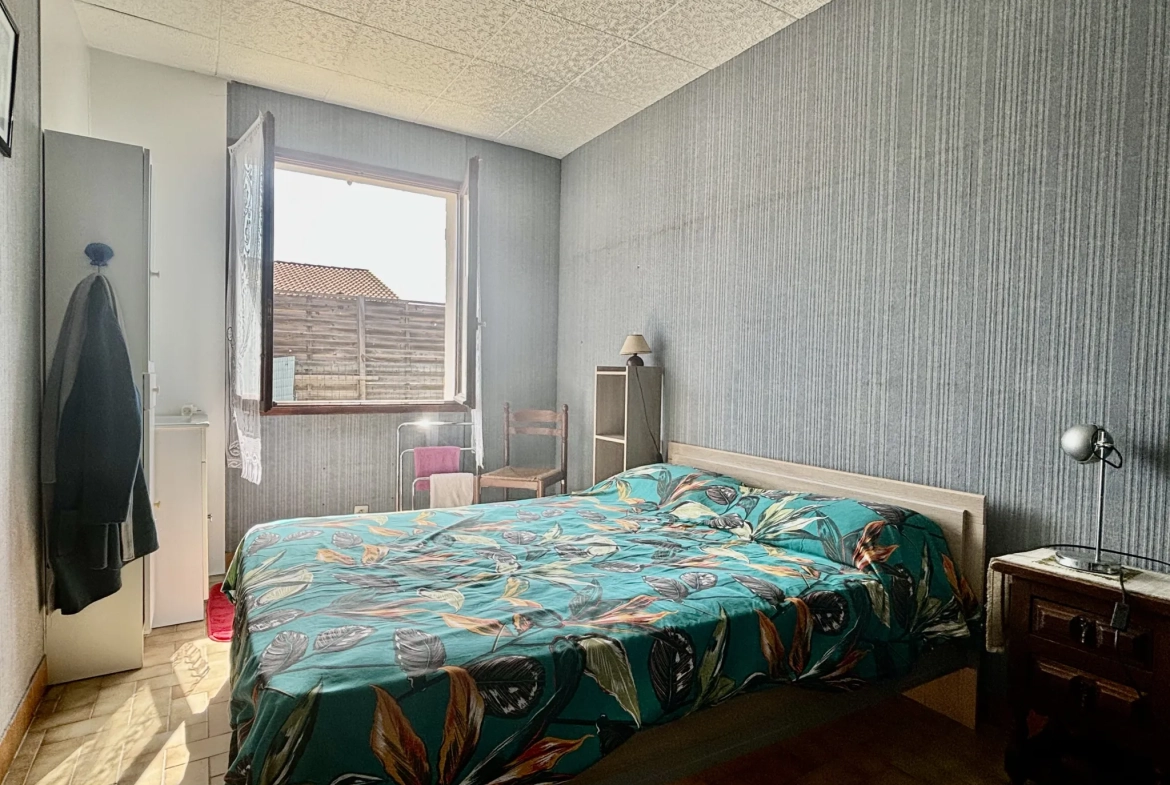 Maison de plain-pied à Pomérols avec garage, atelier et terrain clos de 404 m² 