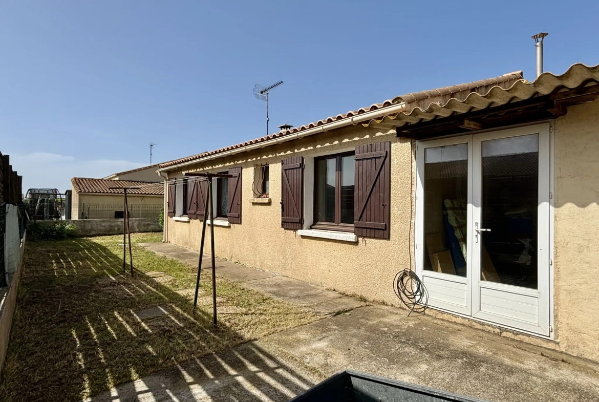 Maison de plain-pied à Pomérols avec garage, atelier et terrain clos de 404 m² 