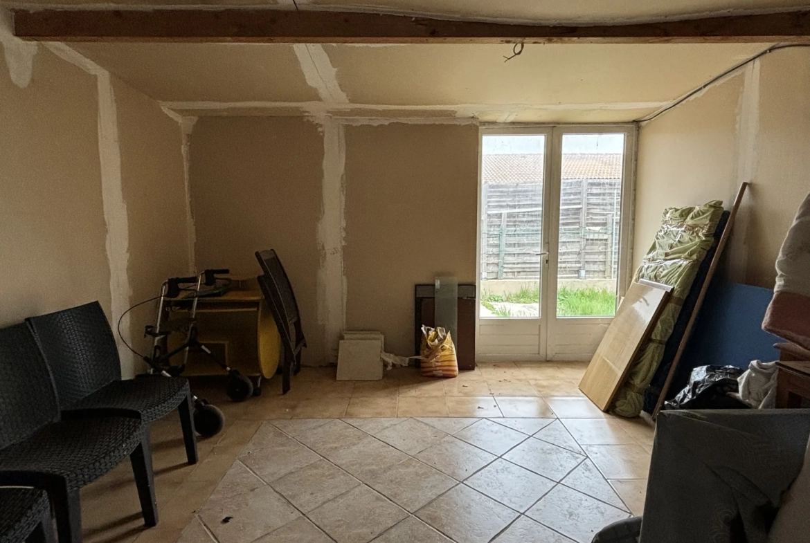 Maison de plain-pied à Pomérols avec garage, atelier et terrain clos de 404 m² 