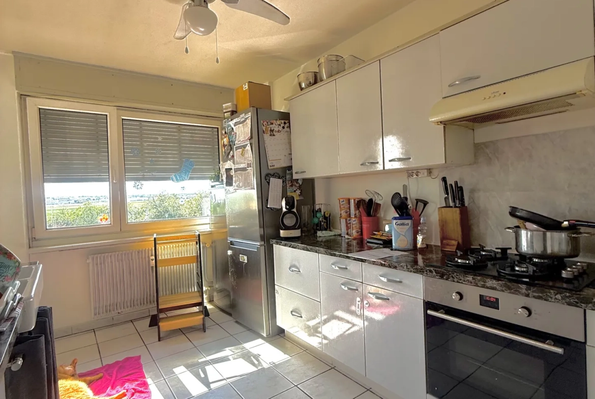 Appartement F3 avec cave et garage à Wittenheim - Dernier étage 