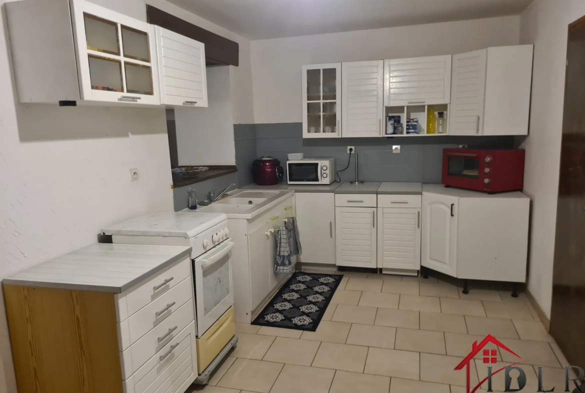 Maison de village à Saint-Dizier de 101 m² avec garage et locataire en place 