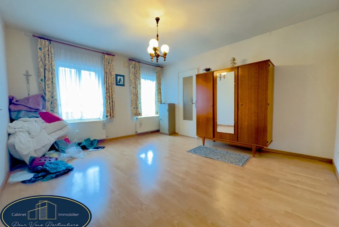 Maison mitoyenne de 73 m² à Haulchin proche A2, cour et cave 