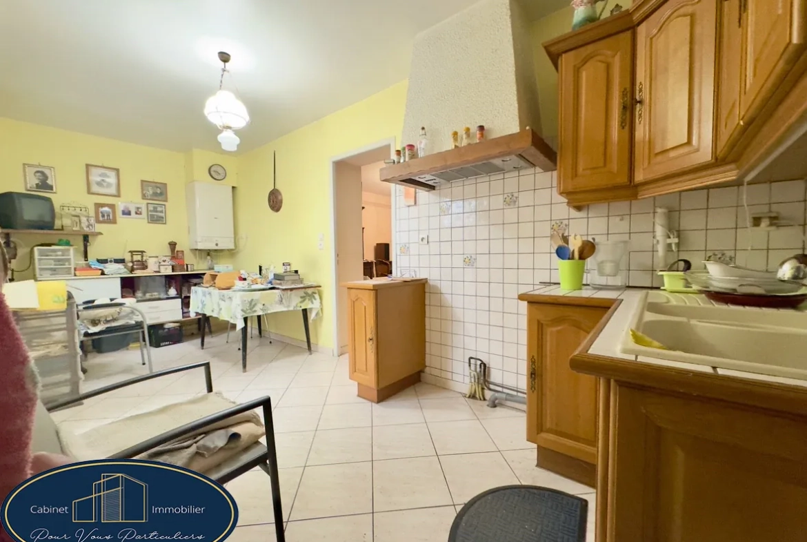 Maison mitoyenne de 73 m² à Haulchin proche A2, cour et cave 