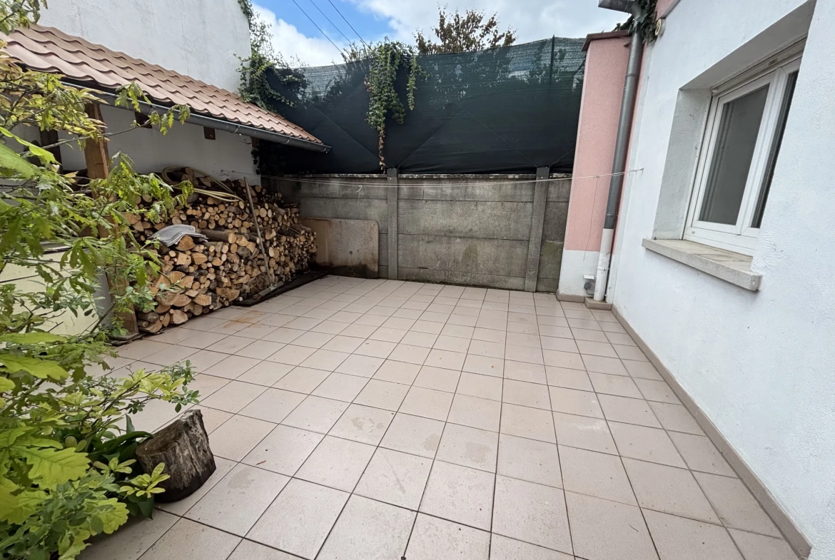 Grande maison familiale à Erstein avec deux appartements et garages 
