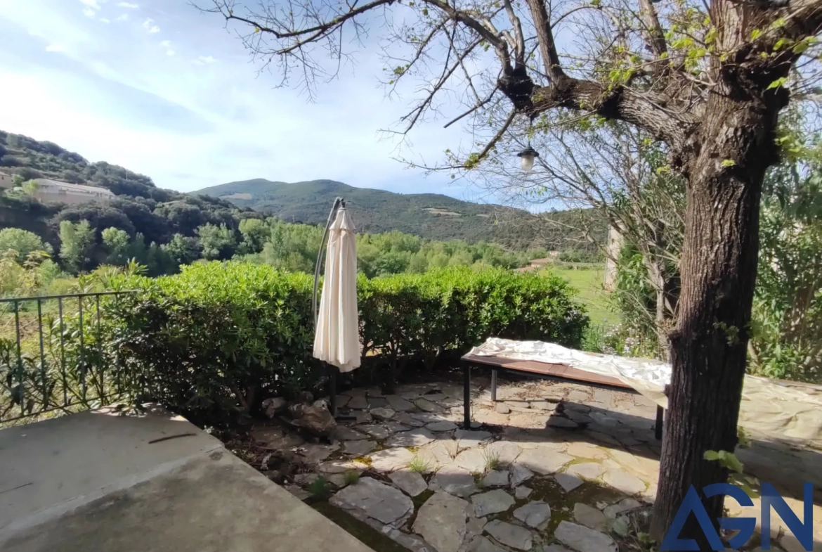 Maison à vendre de 6 pièces et 180 m² à Roquebrun, proche des Gorges d'Héric 