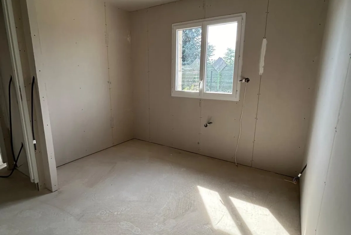 Maison neuve à Roanne avec 4 chambres, garage et terrain de 427 m² 