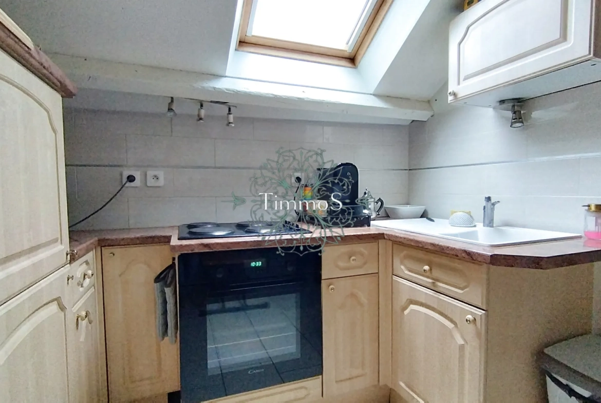 Appartement 2 pièces à vendre à L'Isle-Adam - 33 m² avec chambre et cuisine équipée 