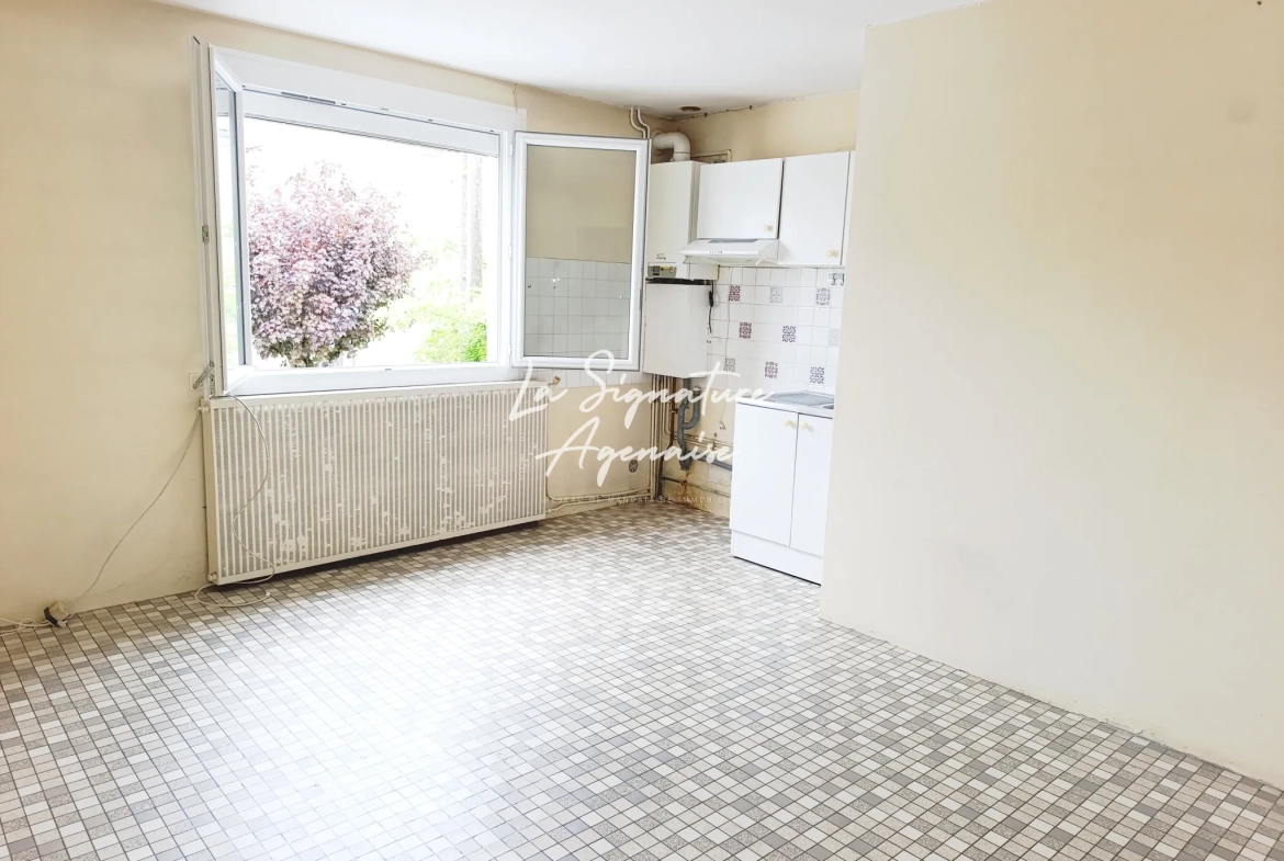 Ensemble immobilier avec maison, appartement, jardin et garage à Clermont-Dessous 
