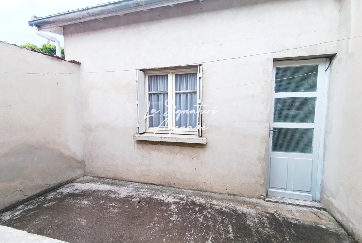 Ensemble immobilier avec maison, appartement, jardin et garage à Clermont-Dessous 