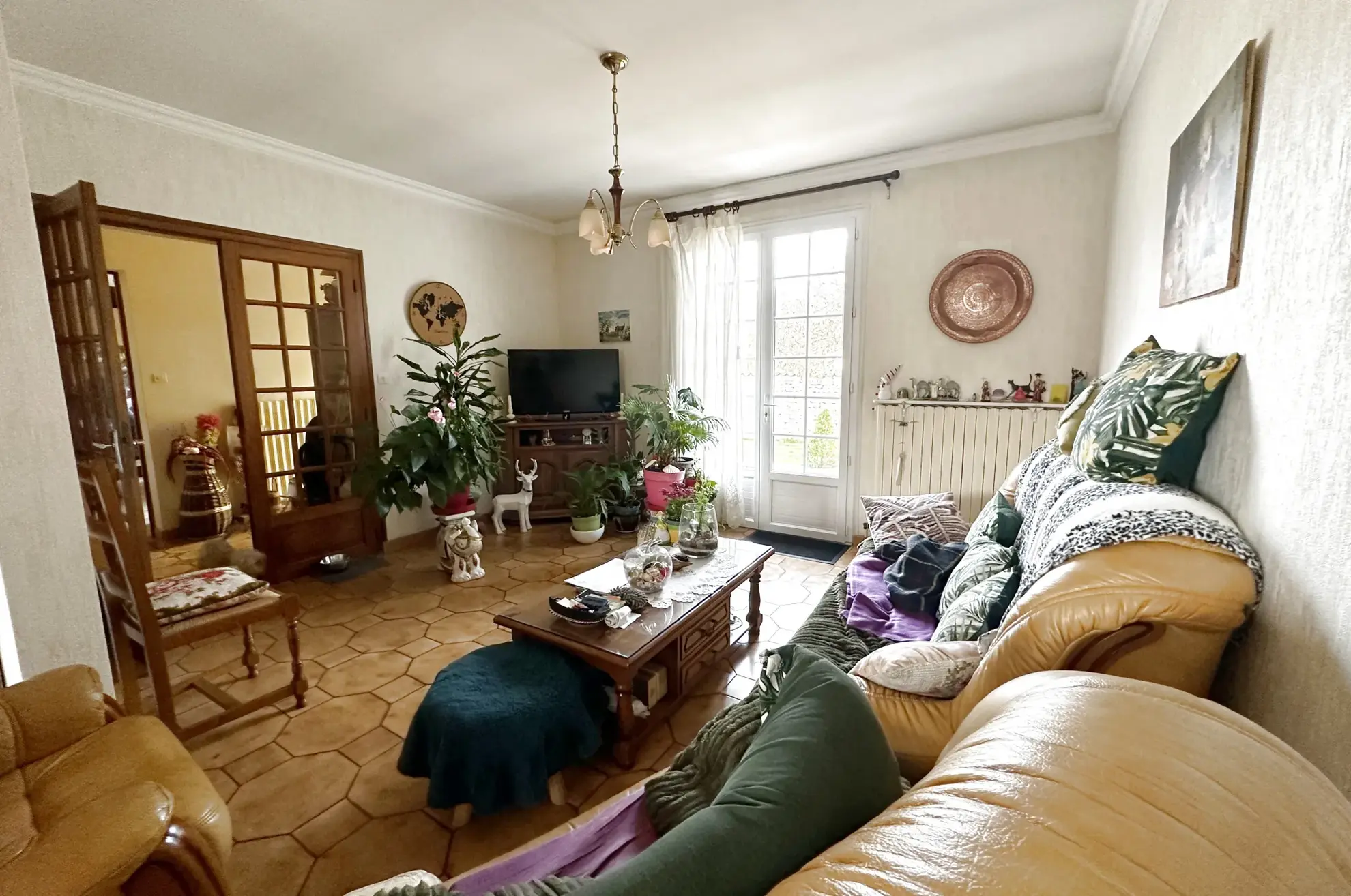 Maison de plain-pied avec grand jardin et garage à Niort - Opportunité à saisir 