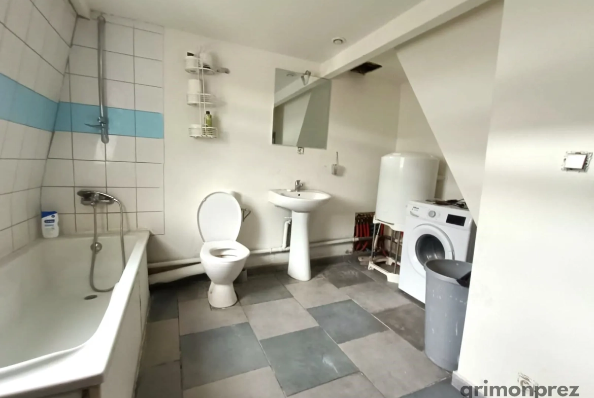 Maison d'investissement avec atelier loué à Roubaix dans le quartier de l'Hommelet 