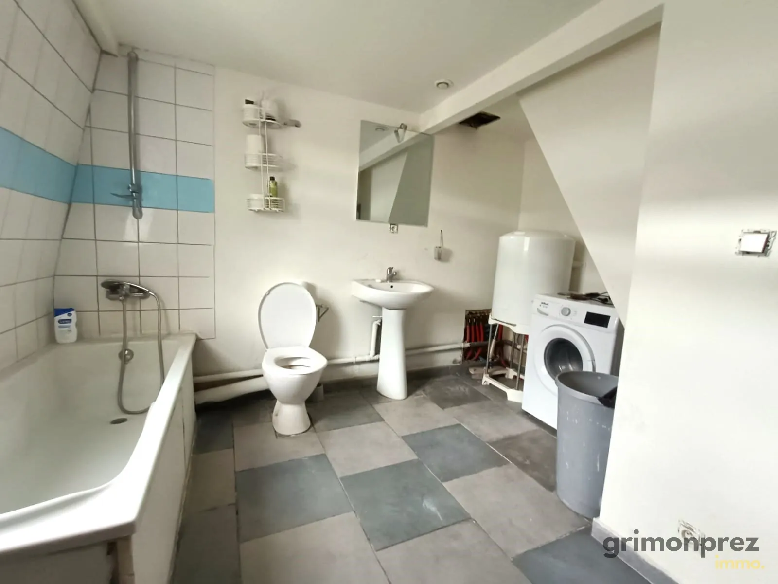 Maison d'investissement avec atelier loué à Roubaix dans le quartier de l'Hommelet 
