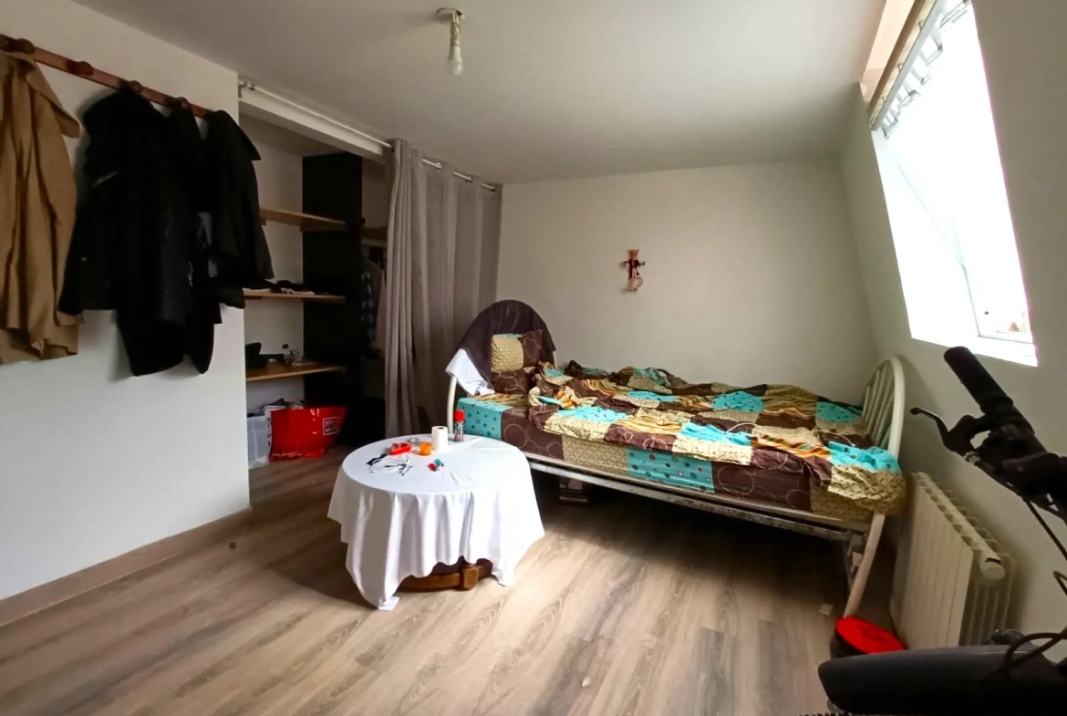 Maison d'investissement avec atelier loué à Roubaix dans le quartier de l'Hommelet 