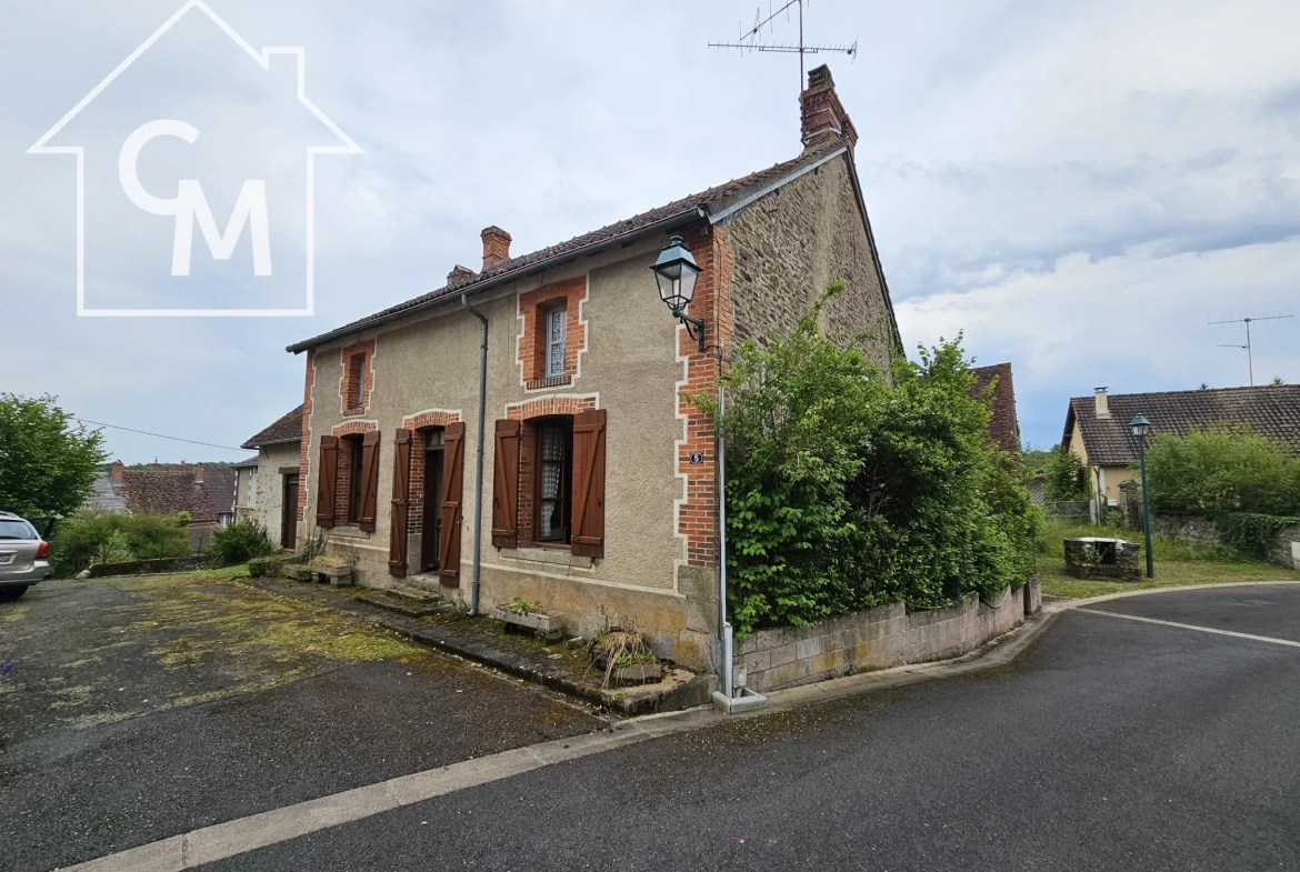 Maison à rénover de 153 m² au centre de Beaulieu avec dépendances 