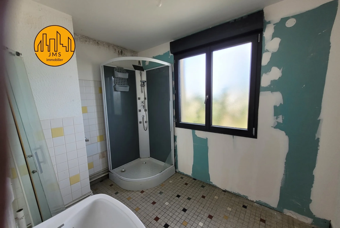 Maison mitoyenne à vendre à Yzeure avec jardin et garage, idéal première acquisition 