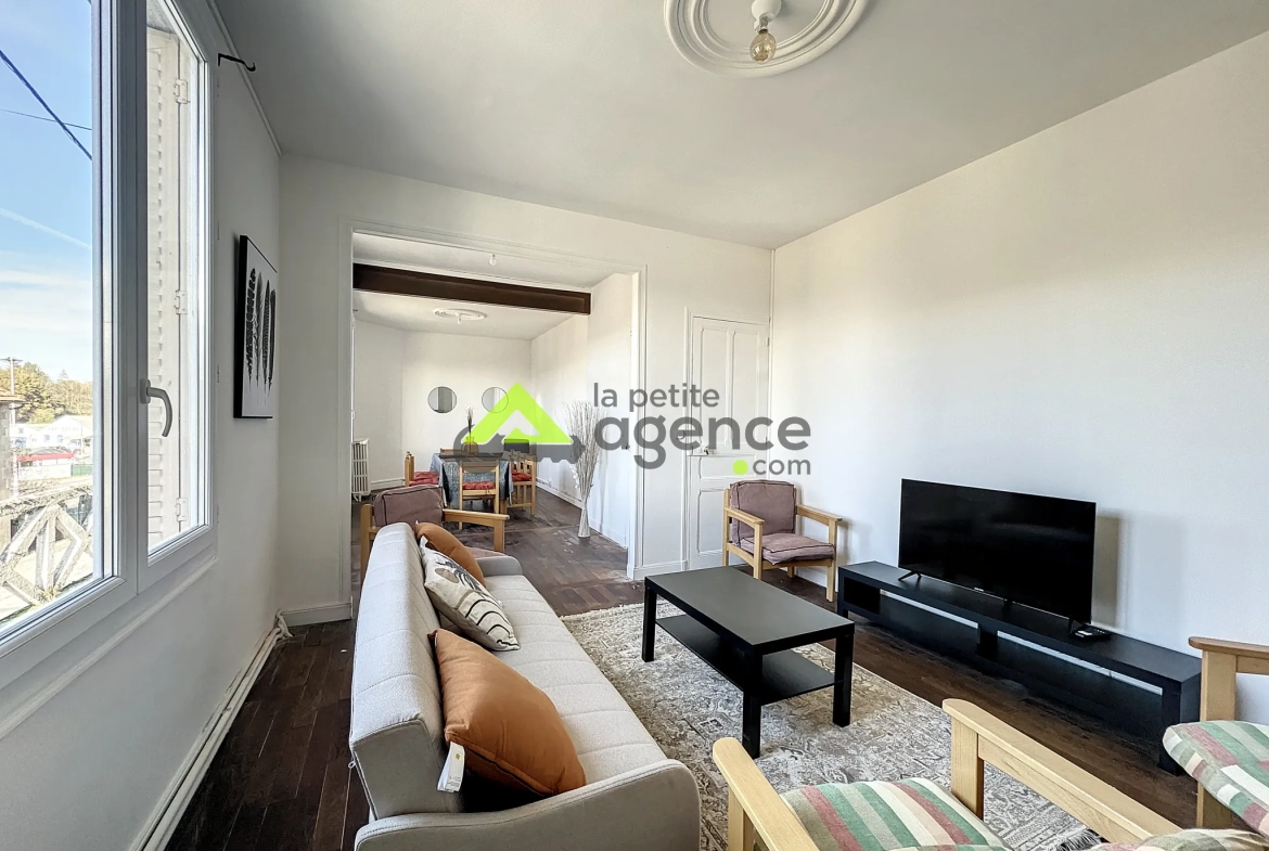 Maison à Bourganeuf avec sous-sol, terrasse et grands garages – 4 chambres, rénovée 