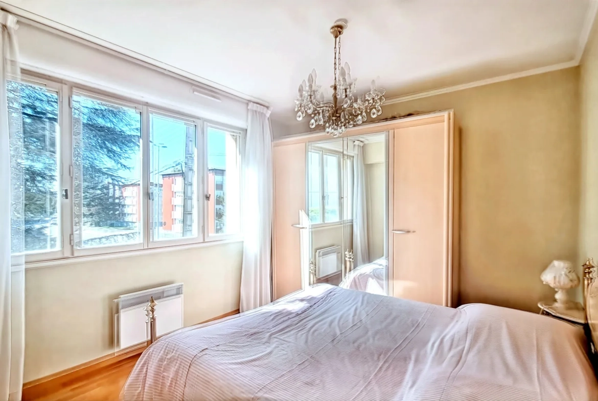 Appartement T4 lumineux avec 3 chambres, balcon et garage à Lempdes 