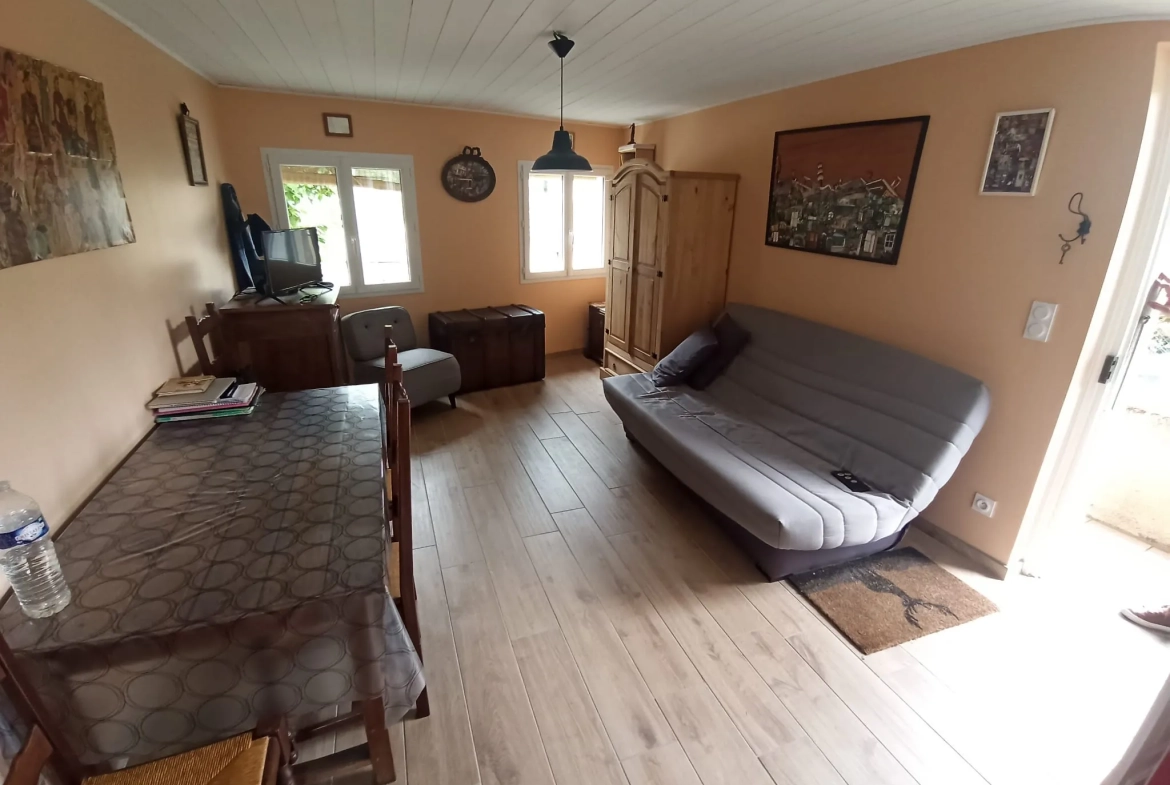 Petite maison à vendre à Roquecourbe avec terrasse, garage et jardin 