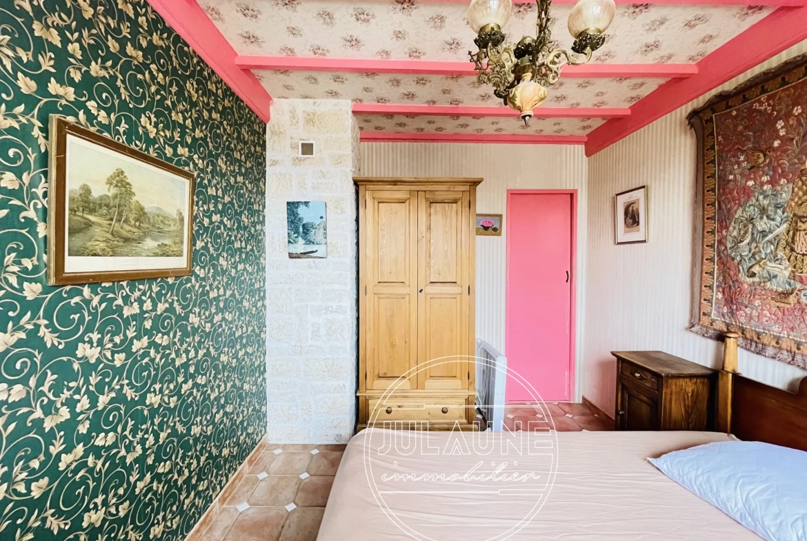 Maison familiale à Isle avec 4 chambres, véranda chauffée et jardin oasis 