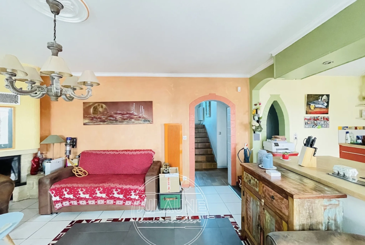Maison familiale à Isle avec 4 chambres, véranda chauffée et jardin oasis 