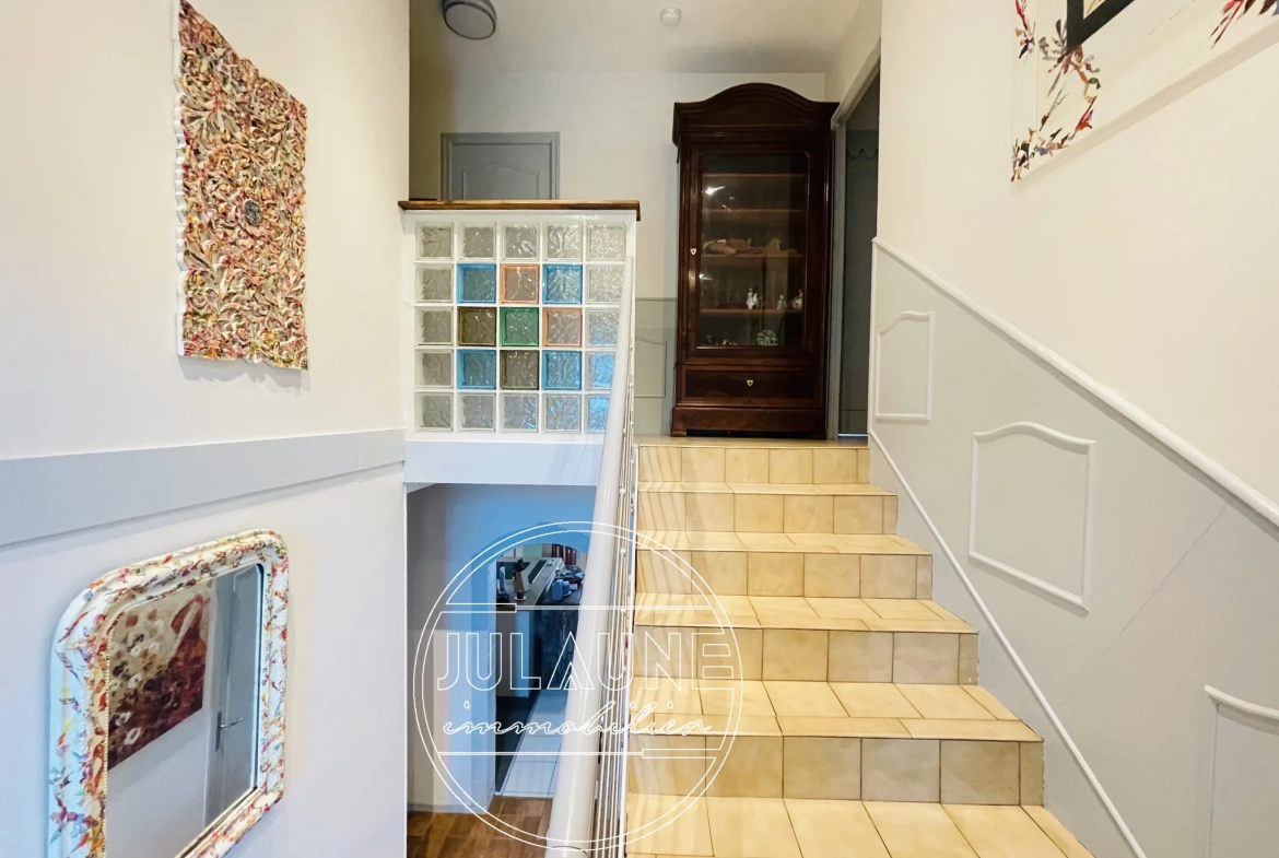 Maison familiale à Isle avec 4 chambres, véranda chauffée et jardin oasis 