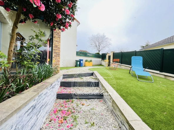Maison familiale à Isle avec 4 chambres, véranda chauffée et jardin oasis