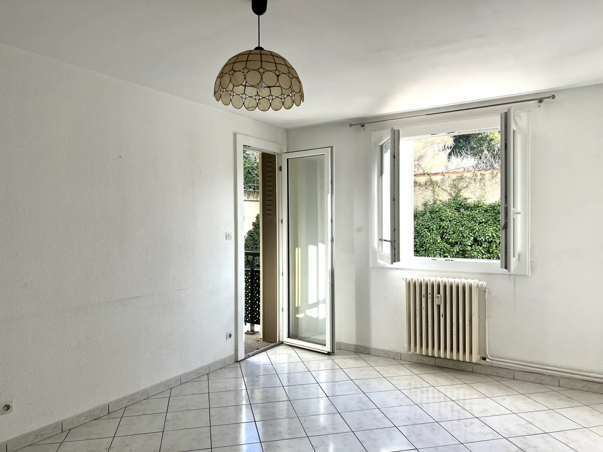 Appartement T4 rénové avec balcon et garage à Carcassonne 