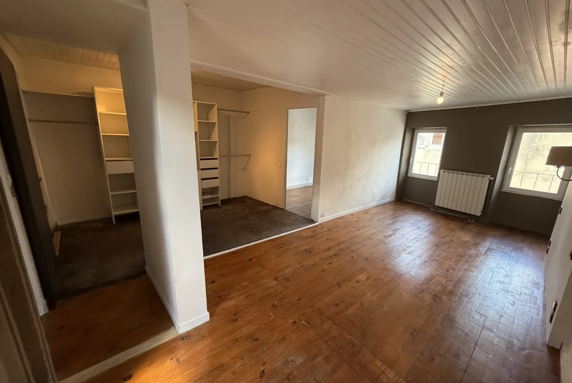 Maison de ville à Gannat - 159m², garage, 4 chambres, charme d'origine 