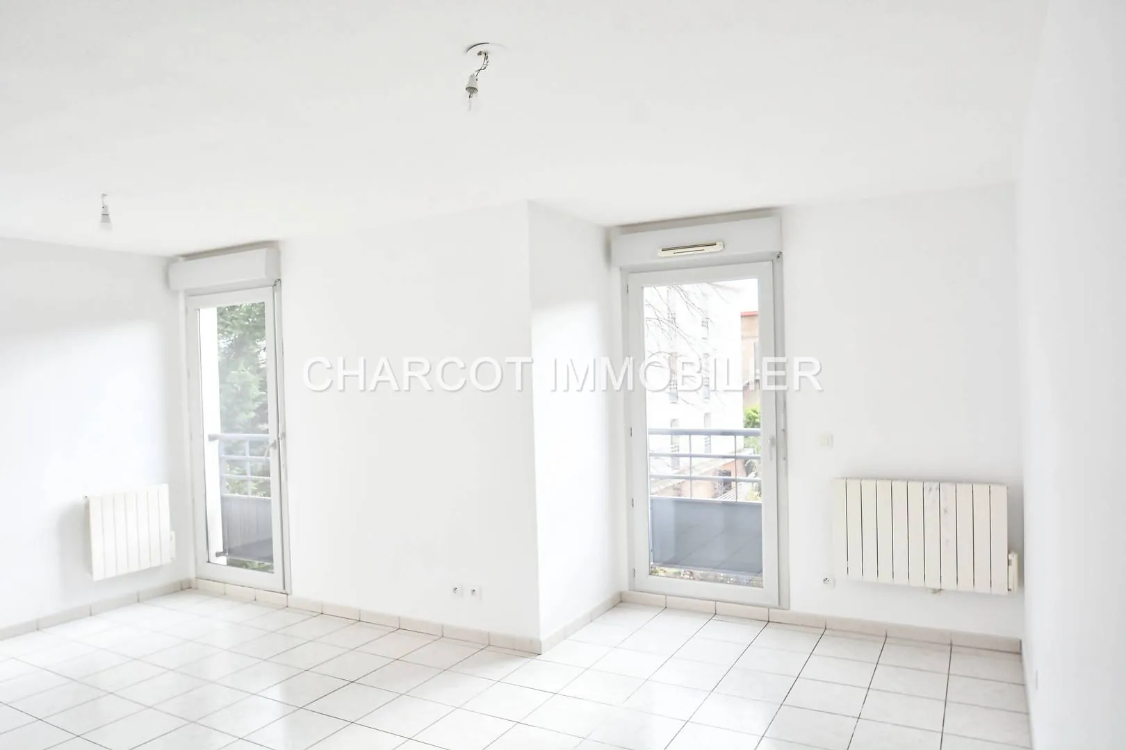 Appartement 2 pièces avec parking à Ste Foy-Lès-Lyon – Résidence récente 
