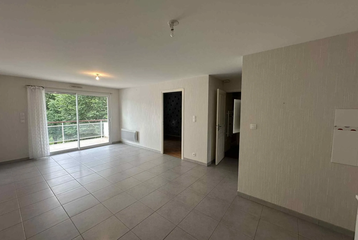 Appartement T2 en centre-ville de Baud avec garage et cave - Opportunité à saisir 