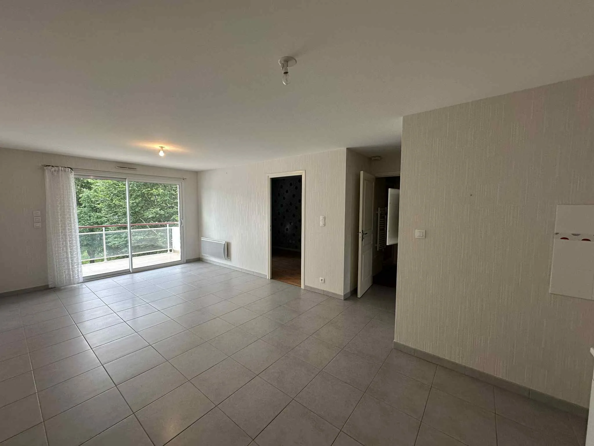 Appartement T2 en centre-ville de Baud avec garage et cave - Opportunité à saisir 