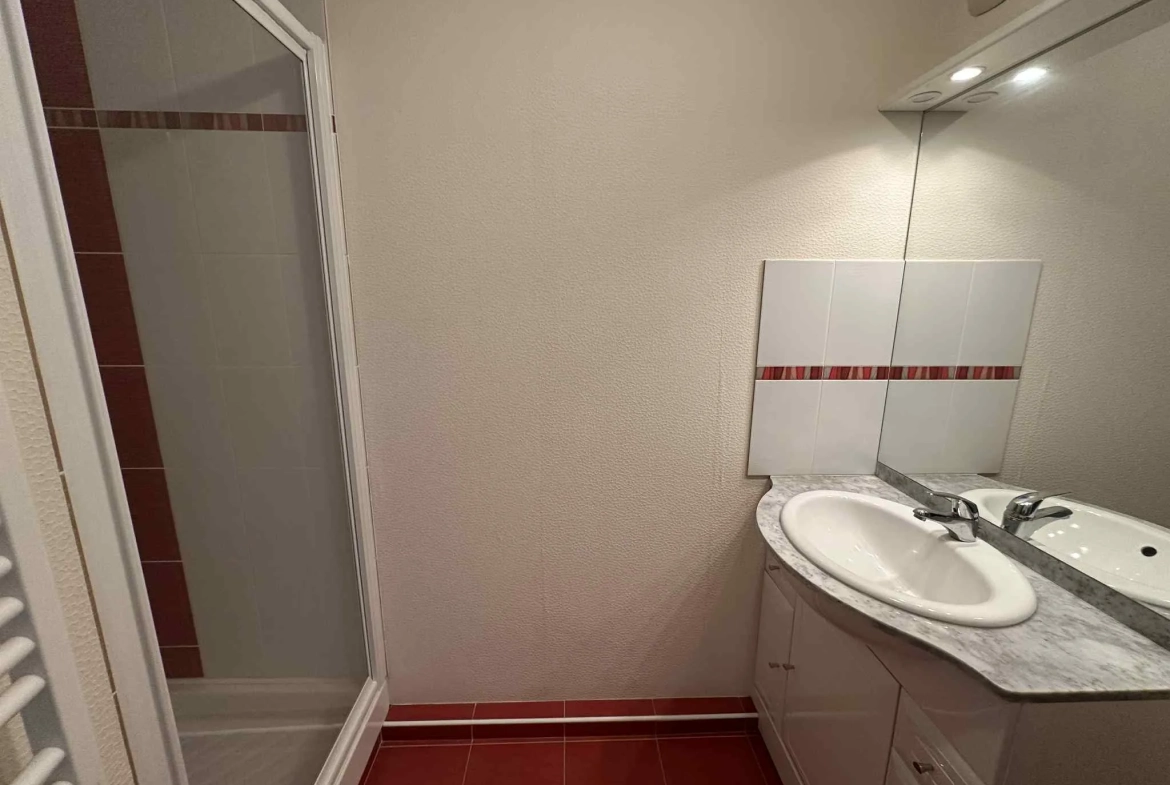 Appartement T2 en centre-ville de Baud avec garage et cave - Opportunité à saisir 