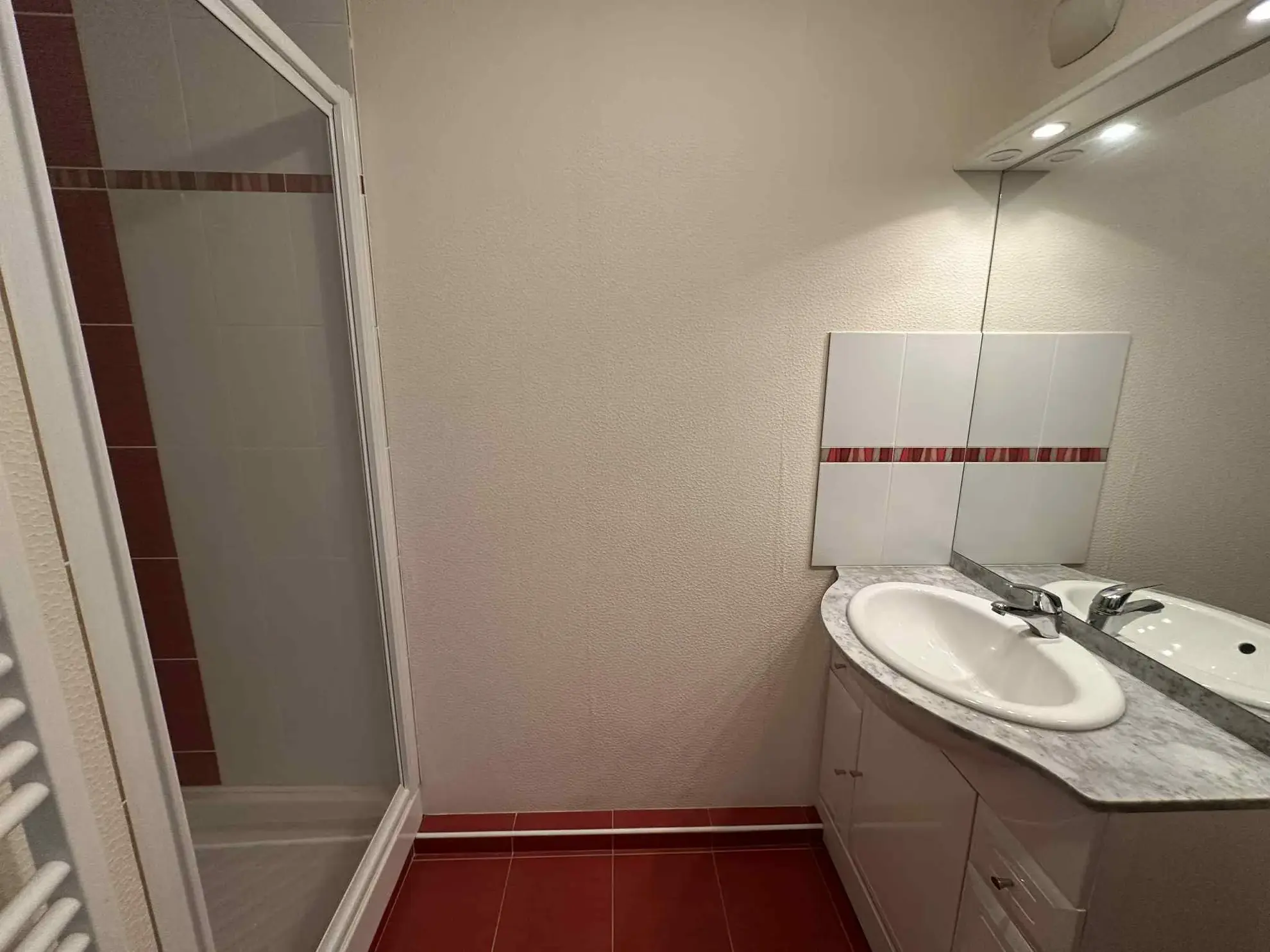 Appartement T2 en centre-ville de Baud avec garage et cave - Opportunité à saisir 