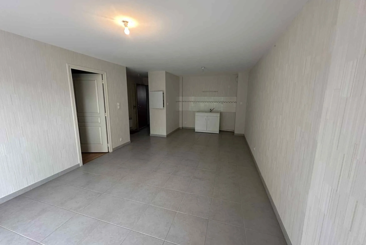 Appartement T2 en centre-ville de Baud avec garage et cave - Opportunité à saisir 