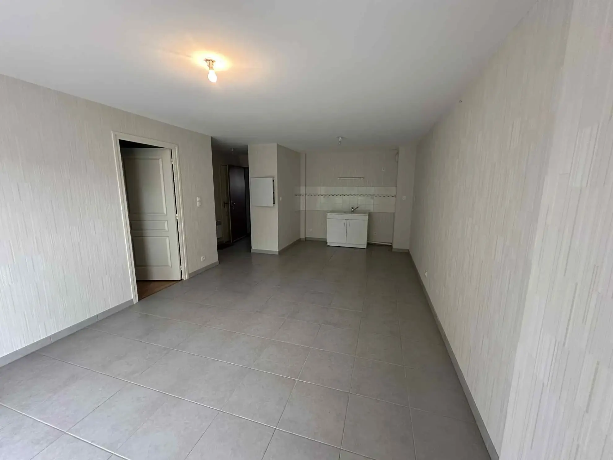 Appartement T2 en centre-ville de Baud avec garage et cave - Opportunité à saisir 